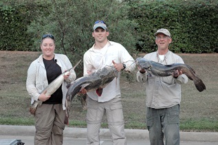 Many fish species were recorded during the 2015 study including Longnose Gar and Flathead Catfish being held by Allison Stoklosa, Dave Keller and Paul Overbeck 